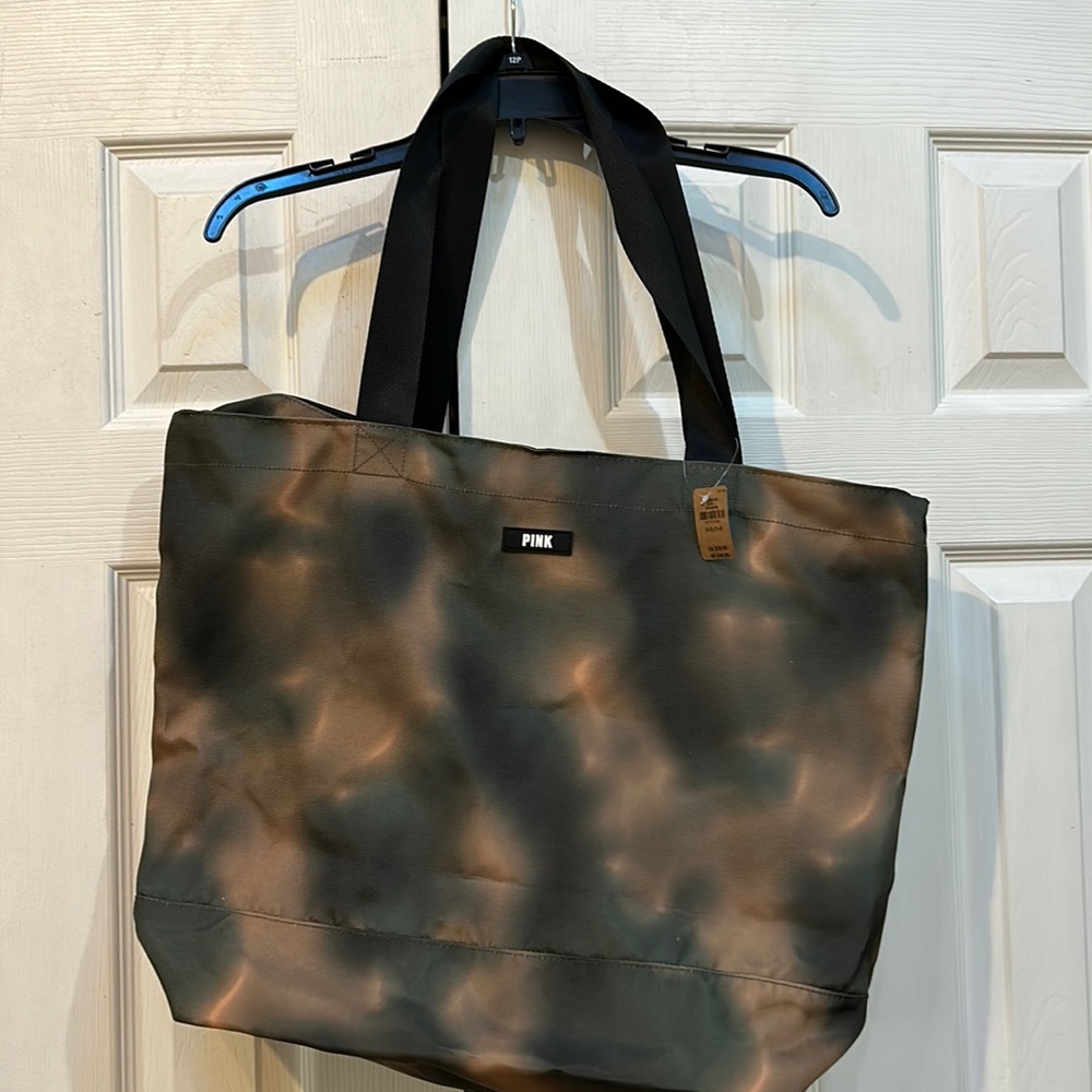 NWT Victoria’s Secret zipper tote bag. Camouflage colored with shoulder straps